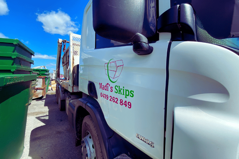 Madi’s Skips truck delivering skip bin hire in Perth